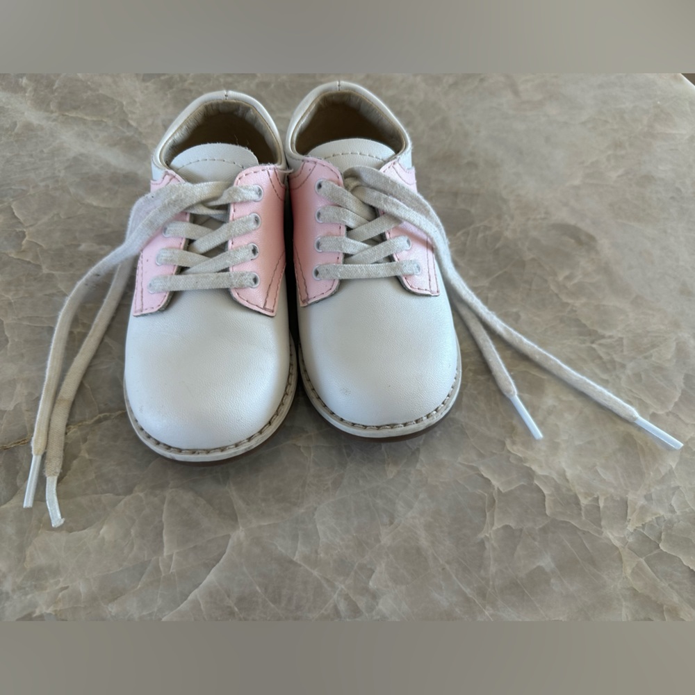 Pink and white saddle Oxford shoes